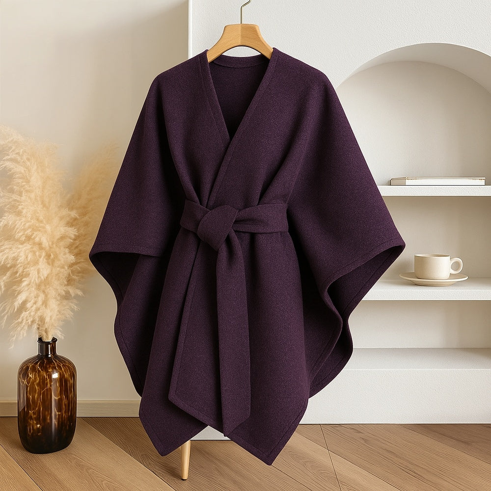 Poncho donna elegante, antivento e versatile, ideale per affrontare il freddo con stile.