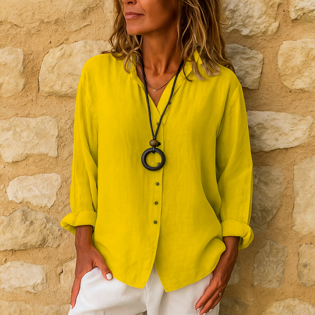 Blusa donna a maniche lunghe con scollo a V, ideale per un comfort quotidiano e uno stile versatile ed elegante.