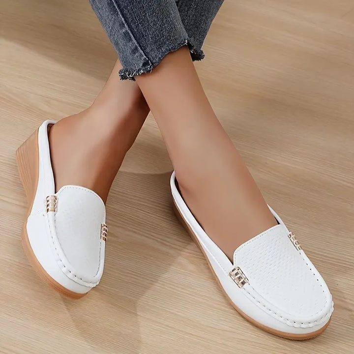 Mocassini mule donna con suola morbida e flessibile, stile casual e raffinato, perfetti per il quotidiano.