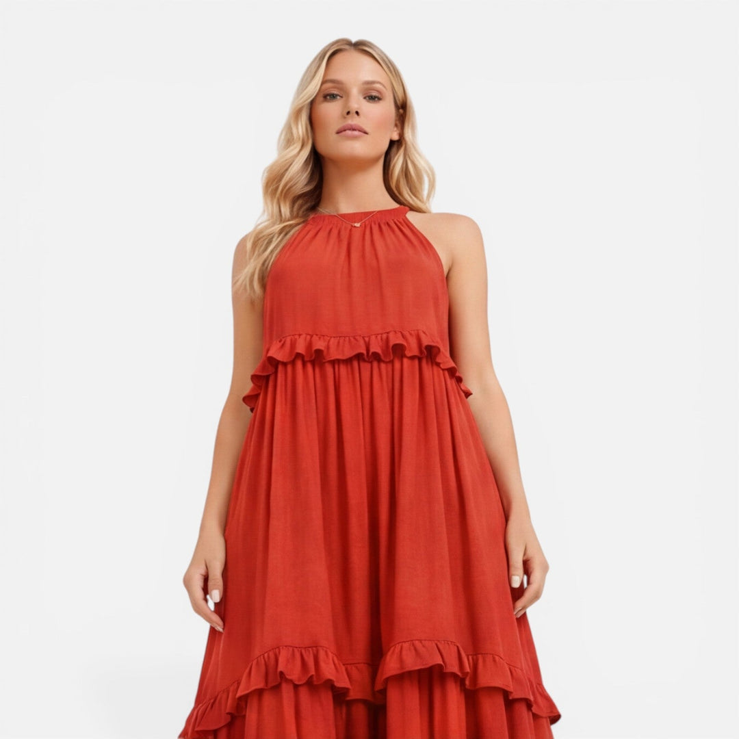 Abito maxi donna per l'estate, leggero e arioso, con balze e design senza maniche, ideale per il caldo.