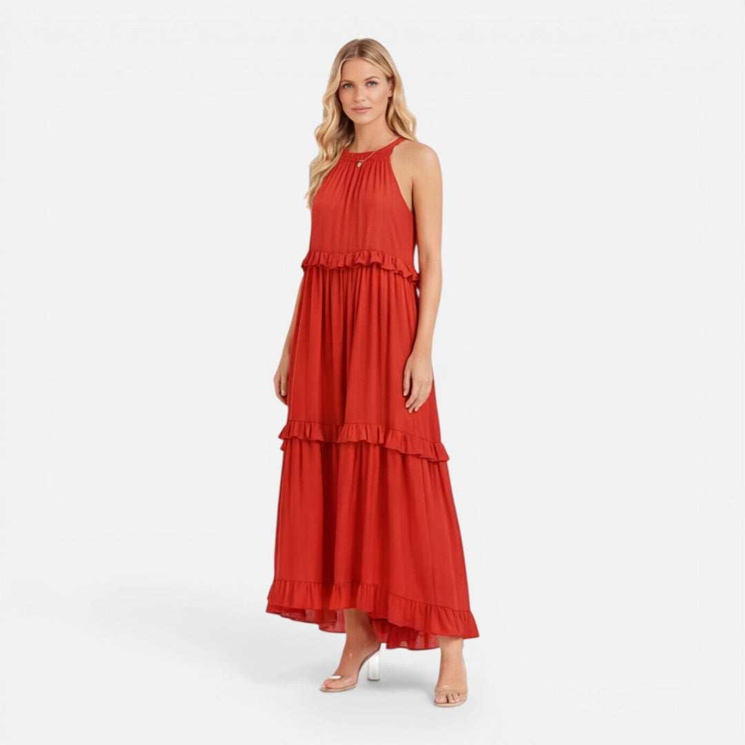 Abito donna estivo con balze, stile maxi, fluido e senza maniche. Essenziale per le vacanze e l'estate.
