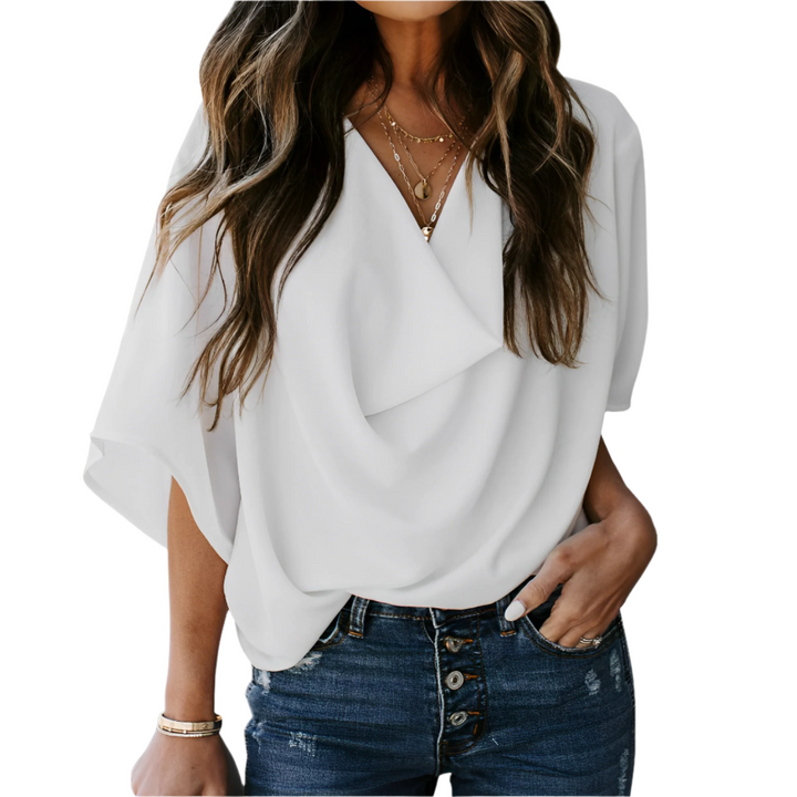 Camicetta donna con scollo a V drappeggiato e maniche a tre quarti, un top elegante e fluido per ogni occasione.