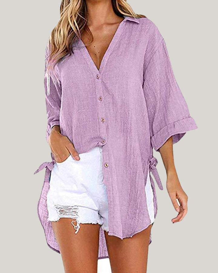 Camicia donna oversize di tendenza, maniche con risvolto e laccetti, ideale per primavera estate.