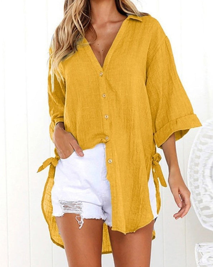 Camicia donna oversize ampia, design unico con laccetti e maniche regolabili, stile casual versatile.