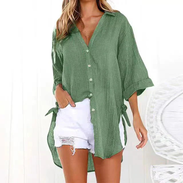Camicia donna oversize con laccetti e maniche risvoltabili, un capo essenziale per la primavera estate.