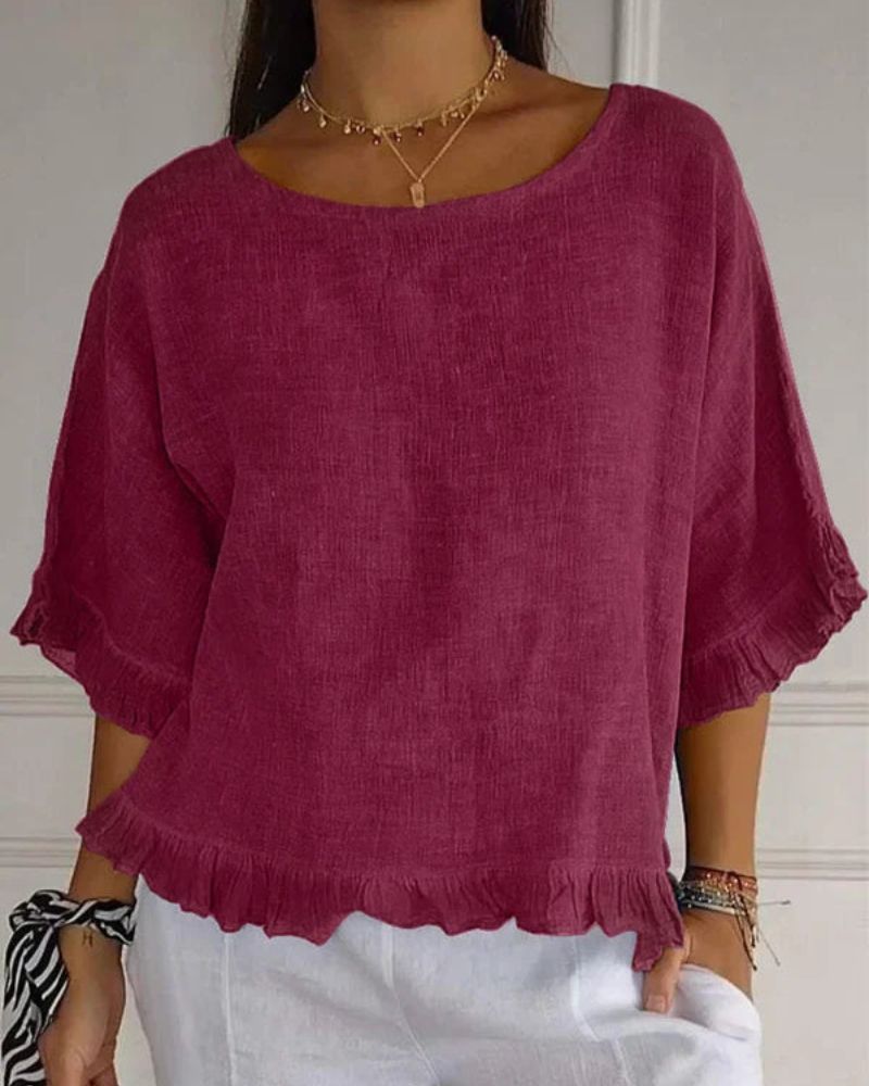 Top da donna estivo blu con volant, scollo rotondo e design boxy, perfetto per il tempo libero.