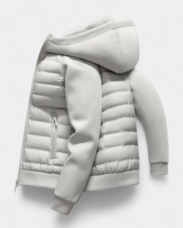 Giacca ibrida da uomo con cappuccio per autunno inverno. Protezione leggera e stile casual sportivo.