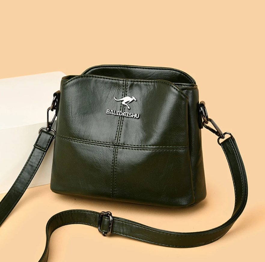 Borsa a mano in pelle, stile versatile e classico, accessorio moda irrinunciabile.