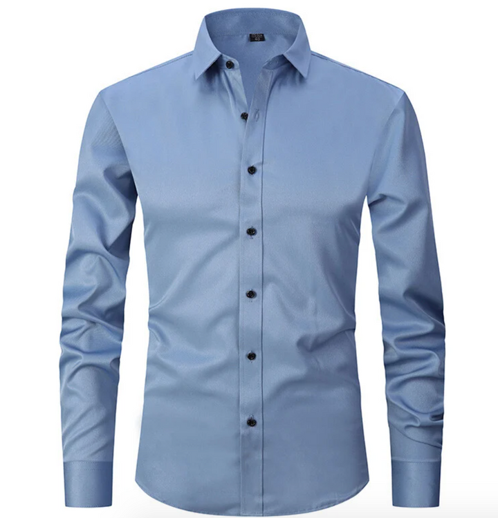 Elegante camicia uomo flessibile, perfetta per look casual chic o outfit formali. Tessuto anti-piega per stile e comodità.