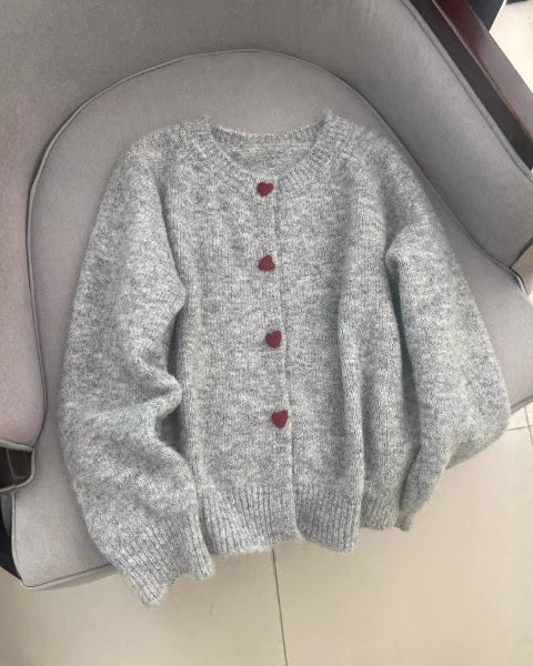 Moda femminile: cardigan elegante donna con bottoni a forma di cuore, ideale per ogni occasione.