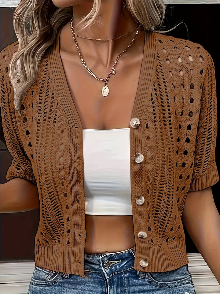 Cardigan corto donna elegante, con trama traforata e traspirante. Perfetto per la moda donna primaverile.