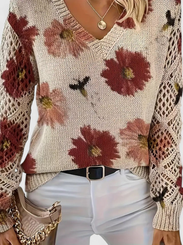 Cardigan donna versatile, stile floreale e maniche traforate. Un capo femminile per ogni occasione casual.