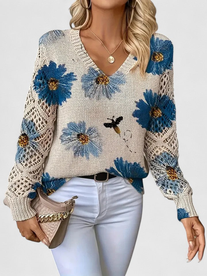 Cardigan donna floreale con maniche traforate, perfetto per la moda primavera ed elegante.