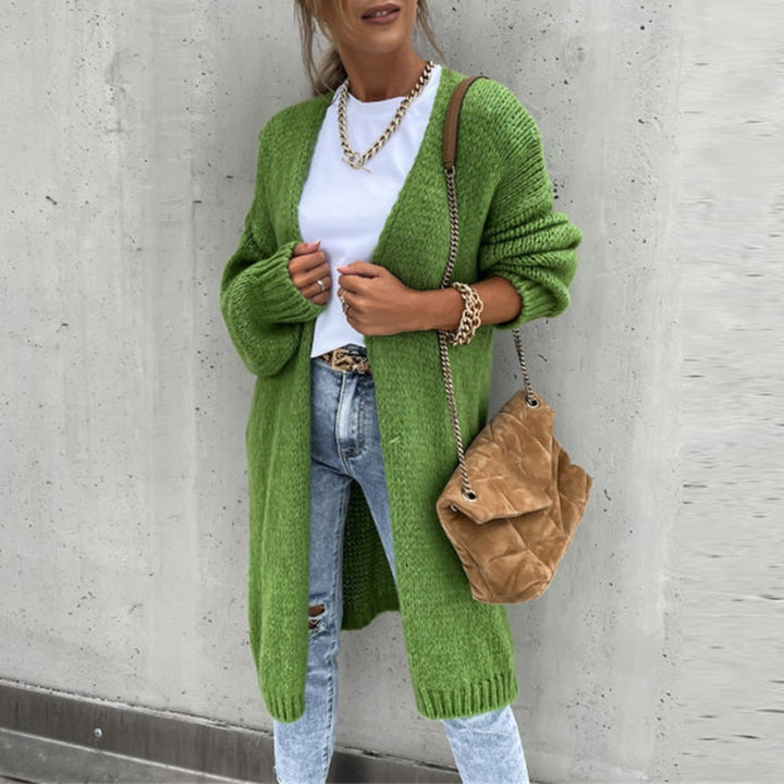 Cardigan lungo donna aperto, versatile e chic, perfetto per look casual o eleganti. Moda autunno inverno.