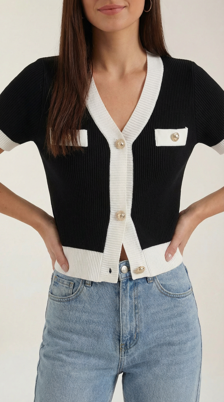 Stile versatile: cardigan cropped elegante a maniche corte, ideale per outfit giornalieri.