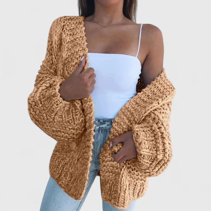 Morbido cardigan donna a maglieria per autunno inverno, con maniche a palloncino, stile casual ed elegante.