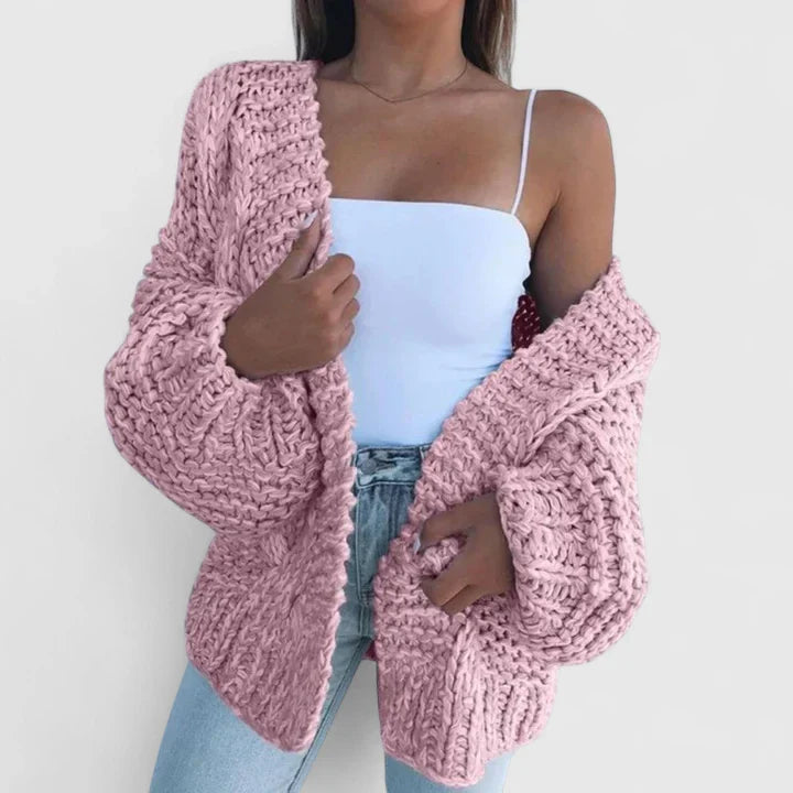 Cardigan donna versatile con design a fronte aperto e maniche a palloncino per un look autunnale chic.