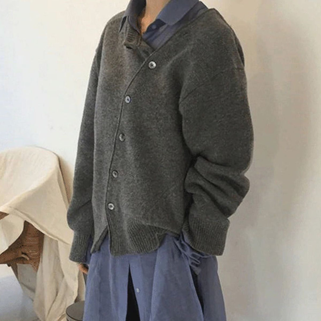 Cardigan donna oversize asimmetrico versatile, adatto per stile casual ed elegante in autunno/inverno.