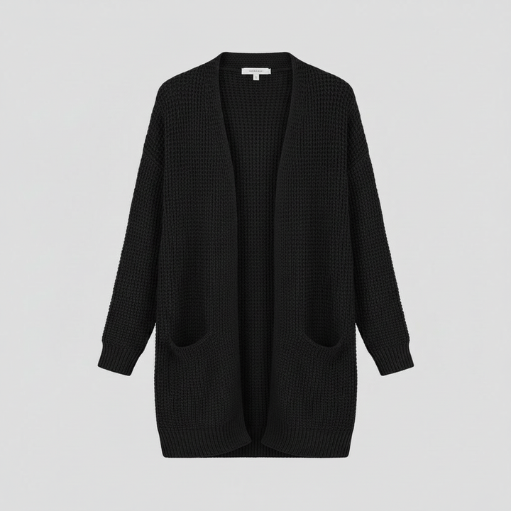 Cardigan lungo rosa da donna, aperto e con tasche, per un tocco di colore alla moda primavera.