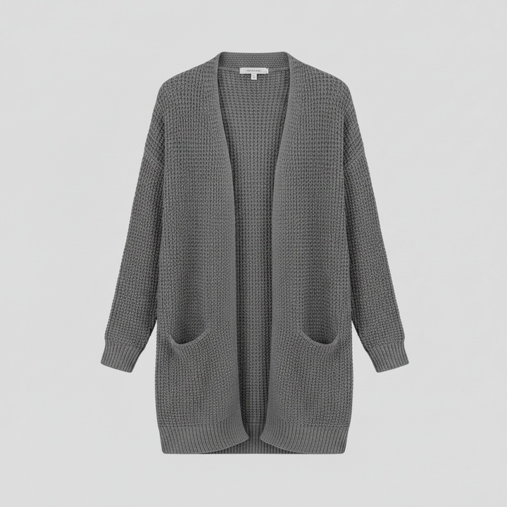 Comodo cardigan lungo da donna, aperto e con tasche, ideale per stratificare look primaverili.