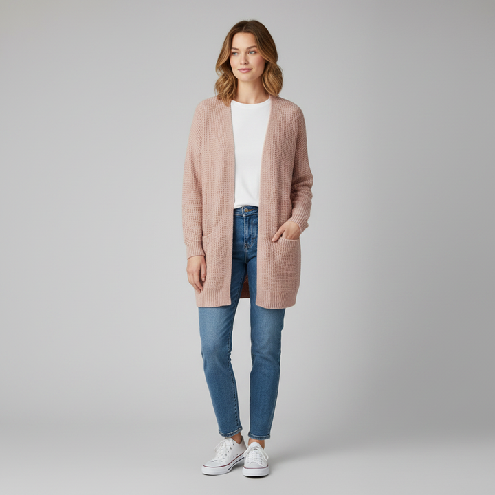 Cardigan donna verde lungo e aperto, con tasche frontali, perfetto per un look casual primavera.
