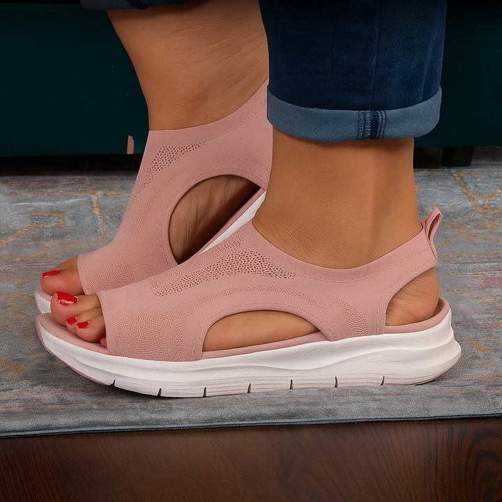 Leggeri sandali ortopedici da donna con supporto per l'arco plantare. Perfetti per passeggiate estive e relax.