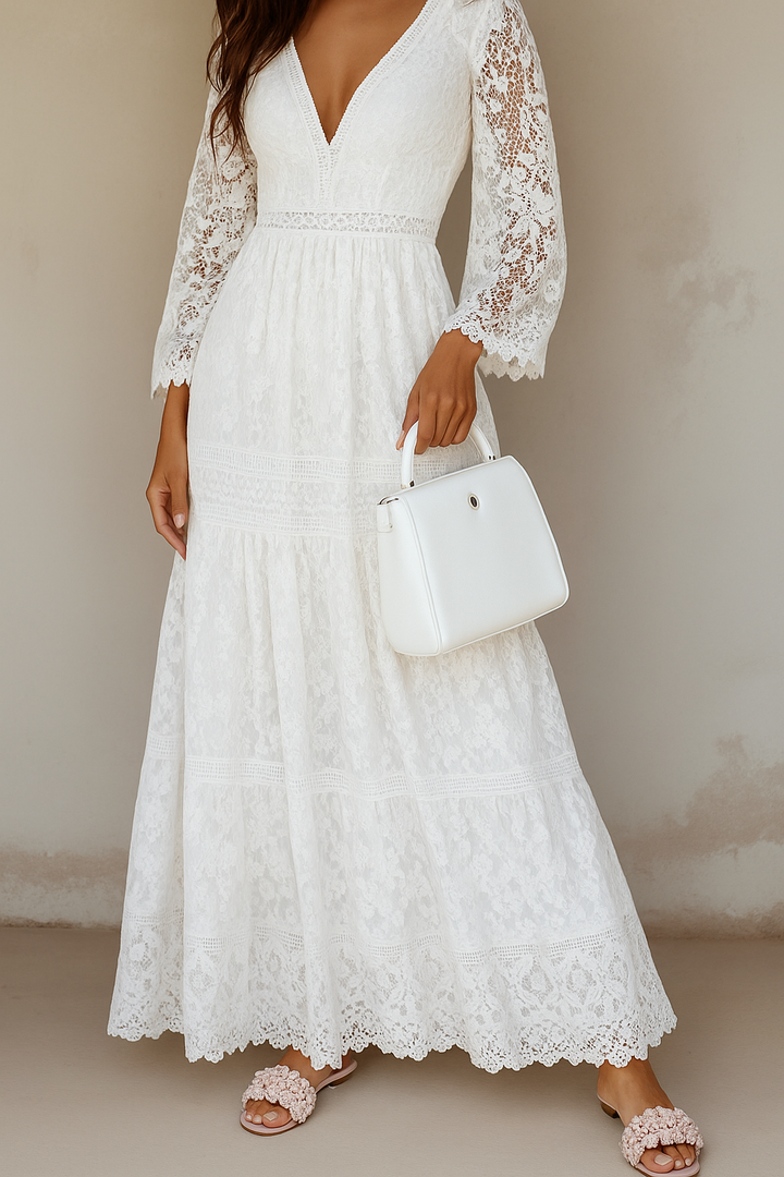 Maxi abito bianco floreale bohémien da donna con scollo a V. Vestito estivo comodo ed elegante per la moda primavera.