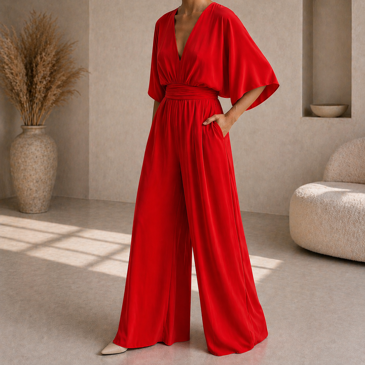 Tuta donna fluida con gamba ampia, ideale per uno stile versatile e confortevole.