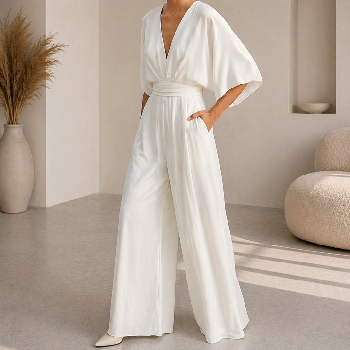 Tuta fluida elegante da donna, perfetta per outfit sera chic e eventi speciali.