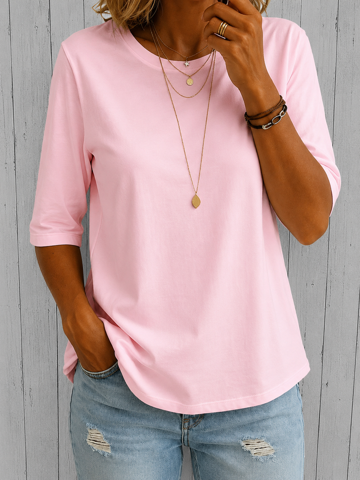 Maglia donna estiva a maniche 3/4, leggera e traspirante per comfort e stile quotidiano.