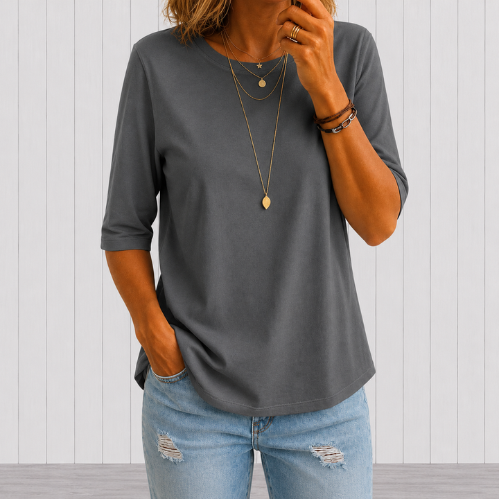 T-shirt donna bianca a maniche tre quarti con girocollo, comfort e stile casual.