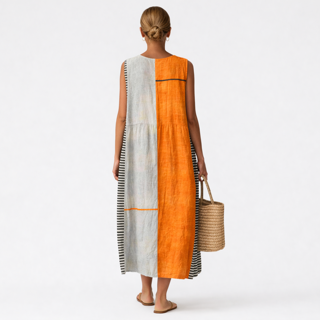 Abito midi donna estivo con design color block e pannello a righe, un capo fresco ed elegante in moda donna.