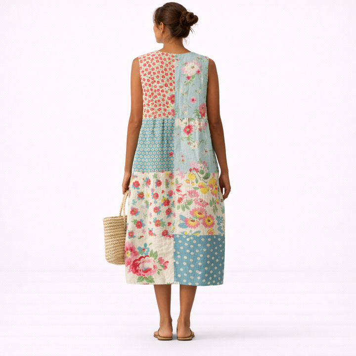 Abito donna senza maniche, stampa floreale patchwork, comodo e trendy, ideale per la moda estiva casual.
