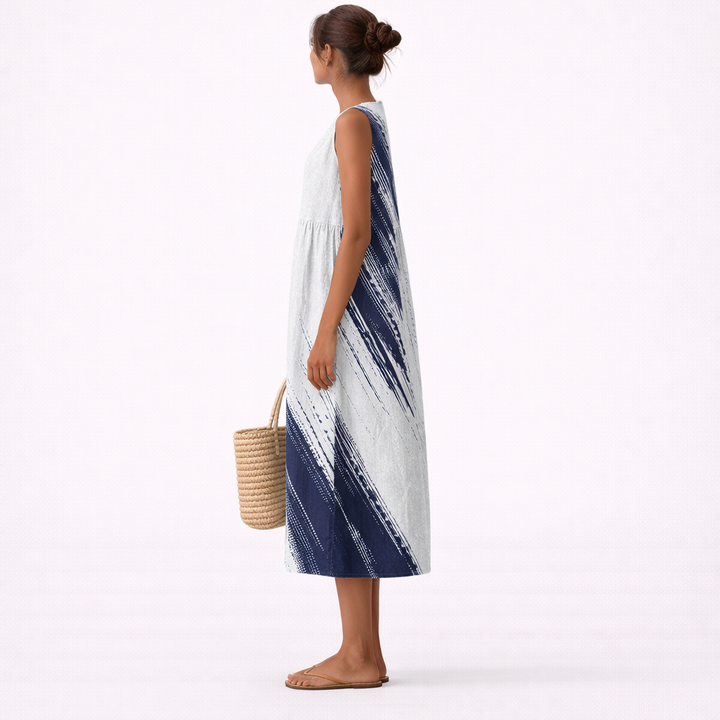 Abito da giorno midi estivo da donna blu, con elegante stampa astratta, modello senza maniche per comfort.