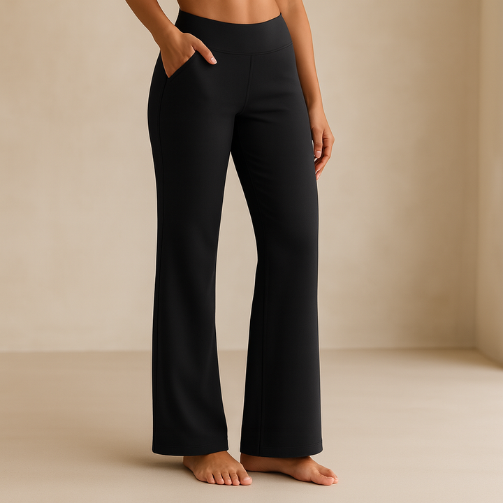 Pantaloni donna neri a vita alta, elasticizzati e comodi, con tasche. Perfetti per outfit eleganti o casual.