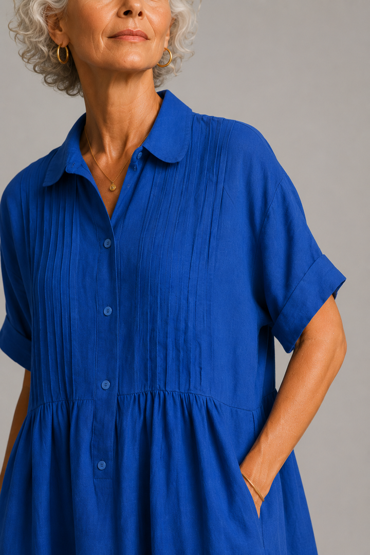 Elegante abito estivo fluido per donna, a maniche corte, ideale per vacanze o look casual alla moda.