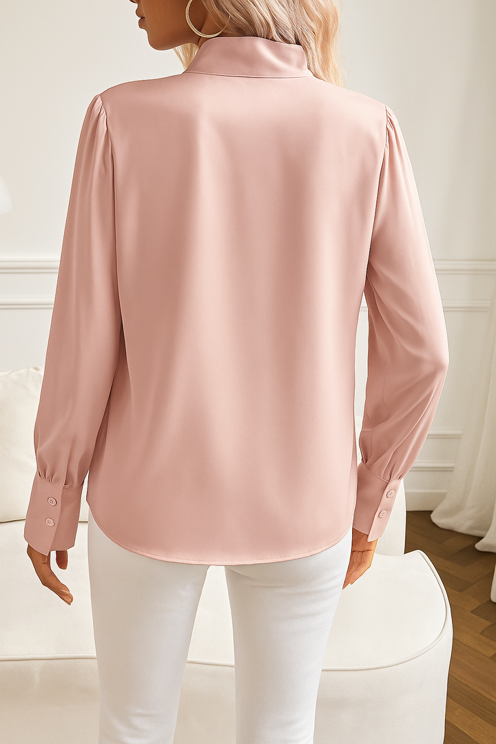 Versatile camicetta donna elegante con fiocco al collo e maniche lunghe, adatta per serate e occasioni chic.