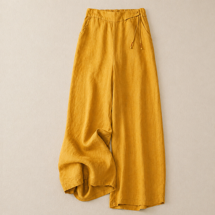 Eleganti pantaloni donna a gamba larga con coulisse in vita, perfetti per uno stile casual-chic e di tendenza.