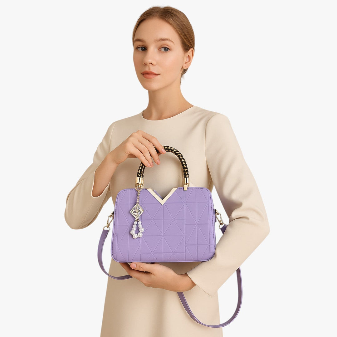 Elegante borsa a mano donna con manici gioiello, design raffinato per eventi speciali.