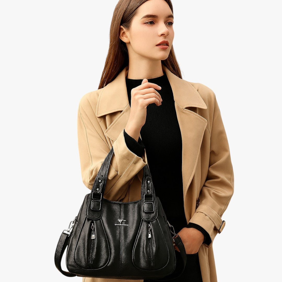 Borsa tote grande marrone, pratica e versatile, con ampi scomparti interni.