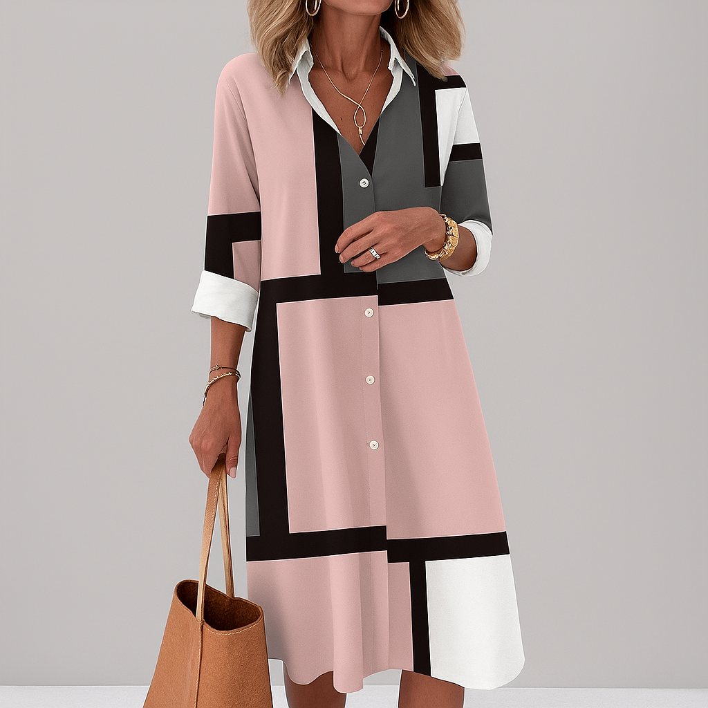 Vestito camicia donna elegante con stampa geometrica, indossato per un look versatile da giorno, ufficio o tempo libero.