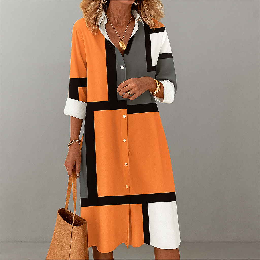 Vestito camicia donna elegante con stampa geometrica, ideale per l'ufficio o eventi casual primaverili.