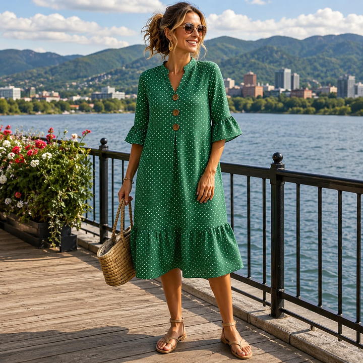 Abito midi donna estivo in cotone con stampa a pois e eleganti volant.