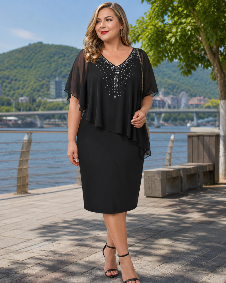 Abito midi elegante da donna con strass scintillanti e mantella chic per serate di gala e cerimonie.