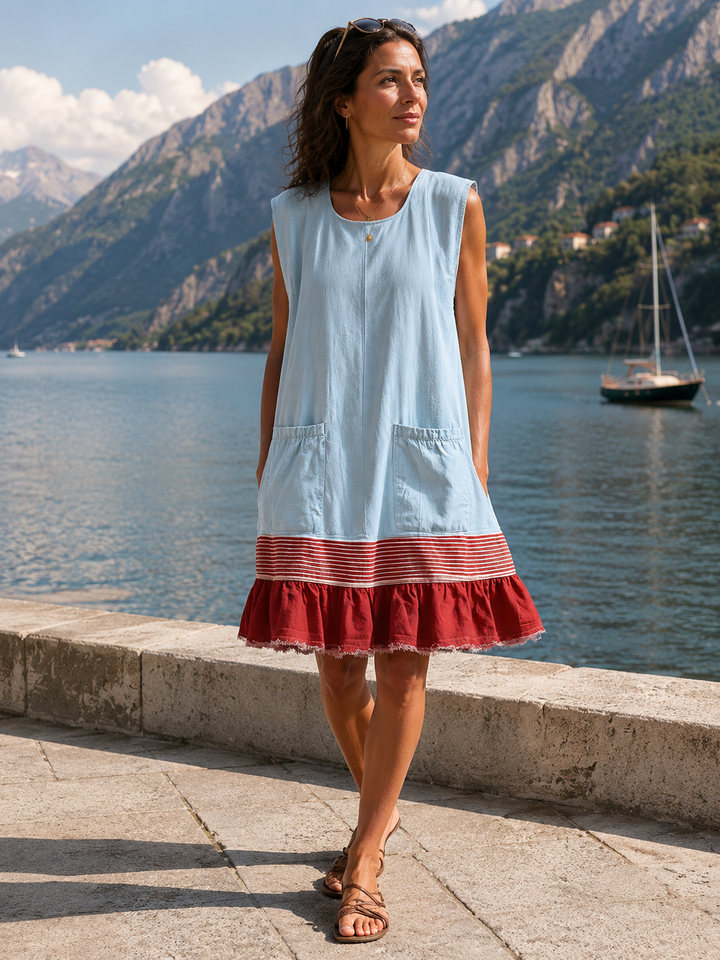 Abito donna estivo senza maniche con orlo arricciato e tasche. Un vestito versatile per la moda casual.