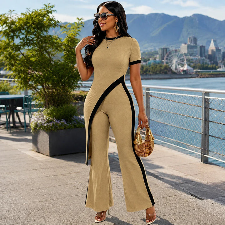 Top asimmetrico chic da donna abbinato a pantaloni a zampa, un set moda femminile casual chic estivo.