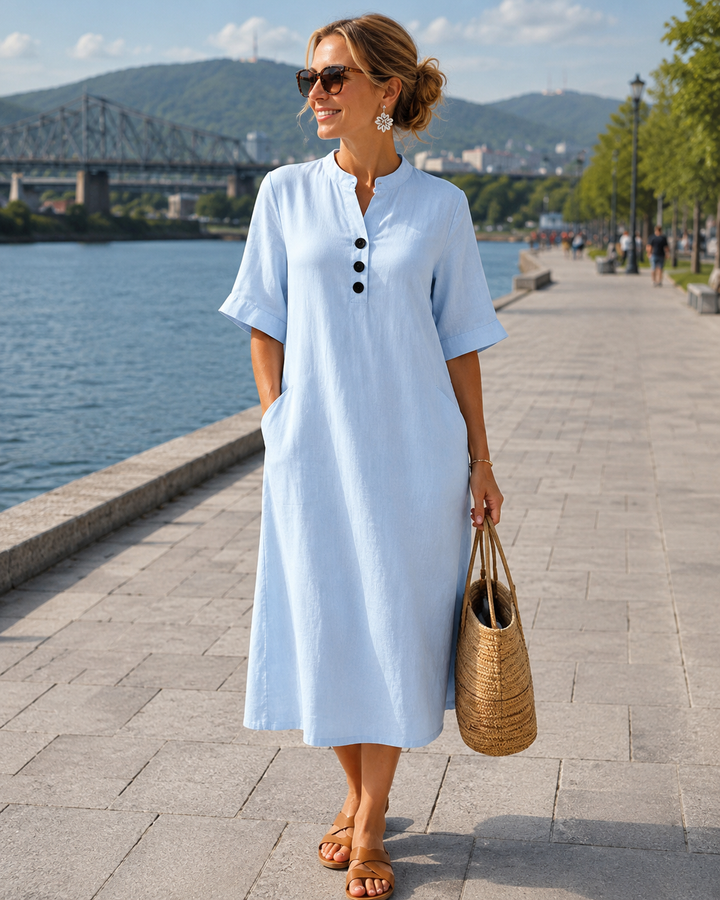 Elegante abito midi estivo da donna in cotone lino con bottoni, vestibilità comoda e traspirante.
