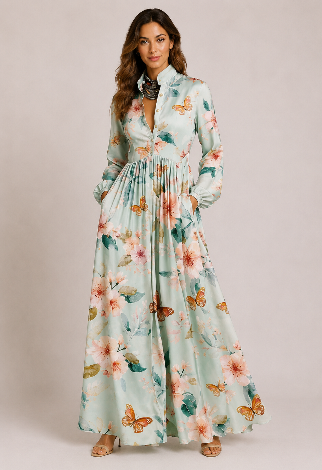 Elegante vestito lungo floreale verde da donna. Abito maxi autunnale perfetto per cerimonie e matrimoni. Moda femminile.