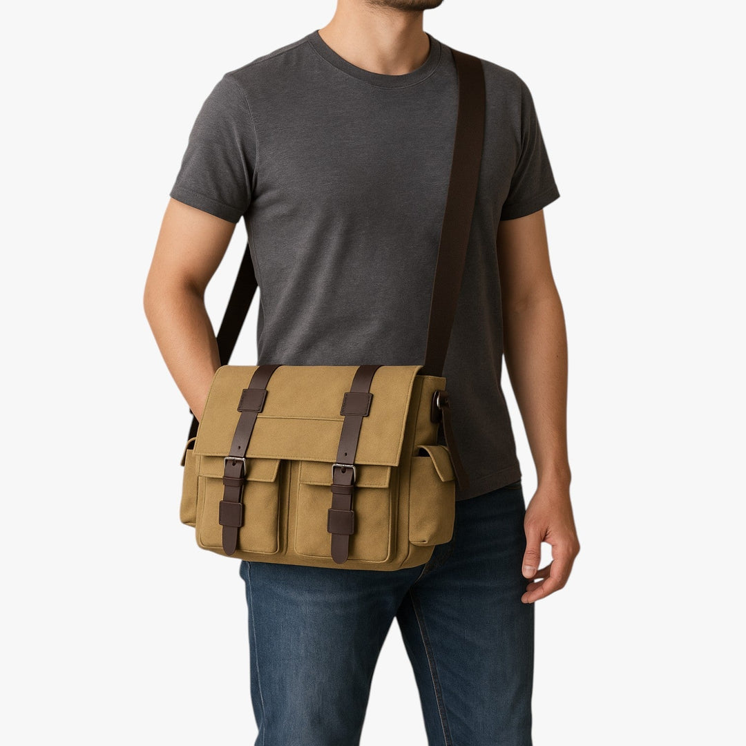 Elegante borsa messenger da uomo in tela, con design multicolore e tracolla, perfetta per ogni occasione.