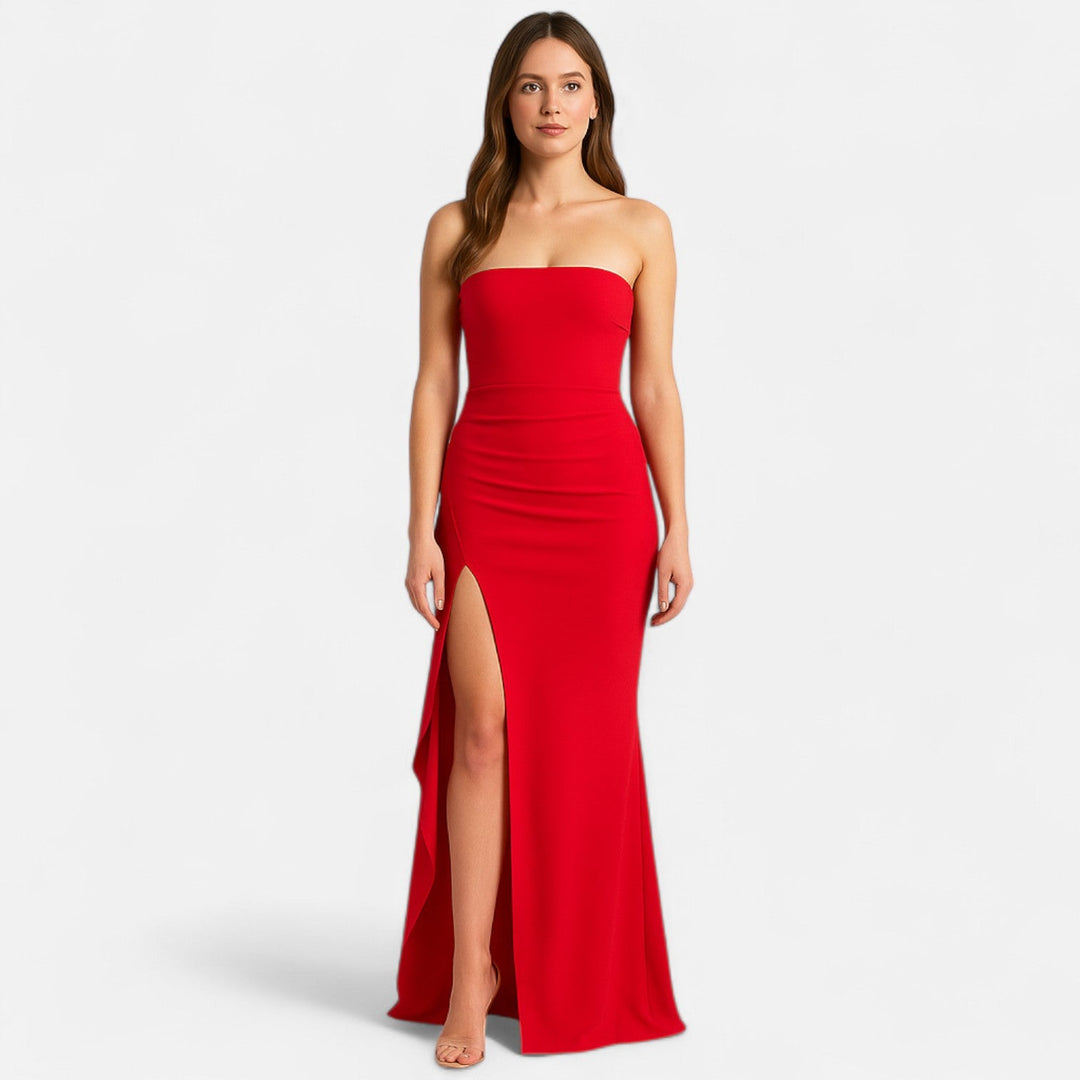 Abito da sera donna glamour con bustier, spacco alto. Vestito elegante aderente, ideale per eventi formali.